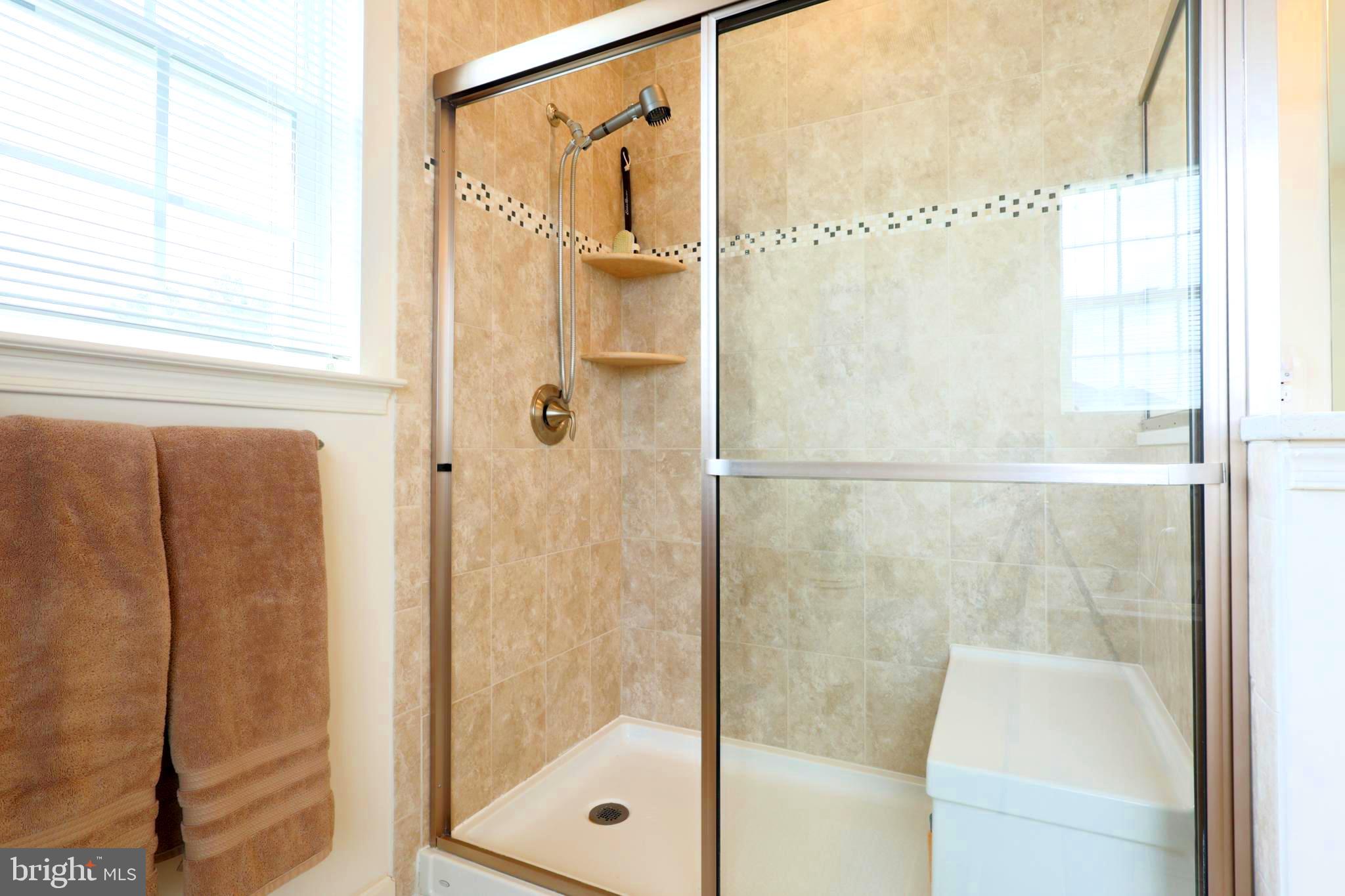 620 Quarry View Court, Unit 407 Reisterstown, MD 21136 - Photo 14 of 25 a bathroom with a shower
