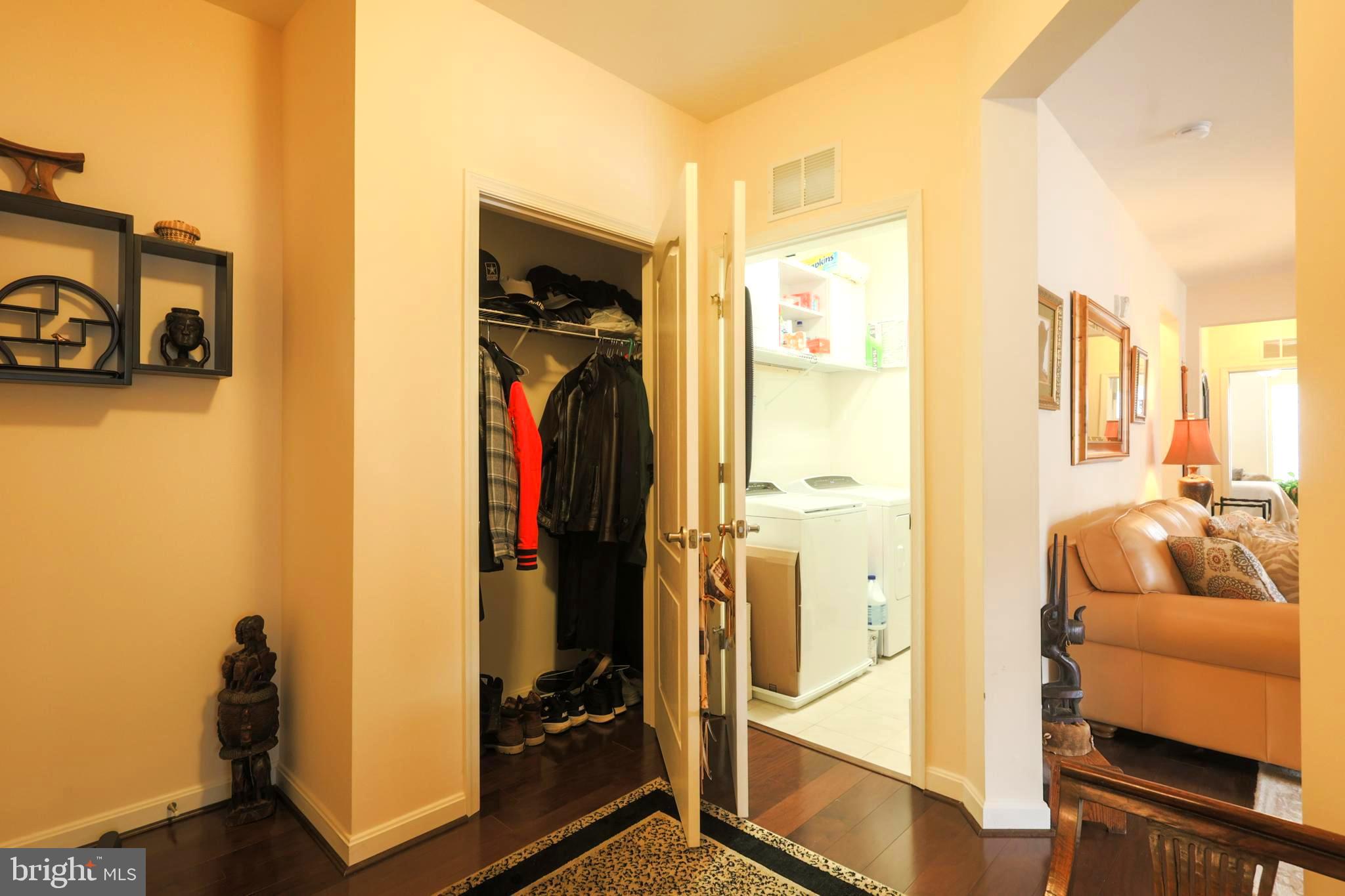 620 Quarry View Court, Unit 407 Reisterstown, MD 21136 - Photo 7 of 25 a view of walk in closet with clothes and shoes