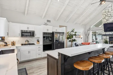 a bathroom with a sink and mirror