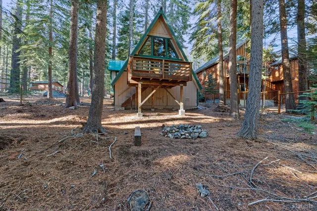 a view of backyard with green space