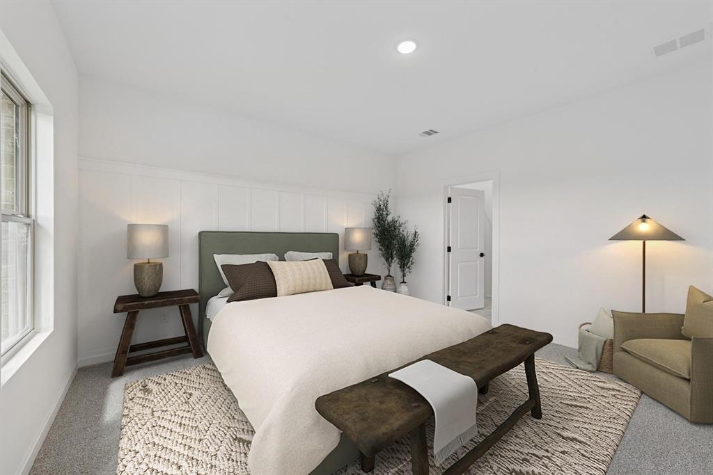 1412 Elliott Road Howe, TX 75459 - Photo 11 of 26 a bedroom with a bed a lamp and a rug