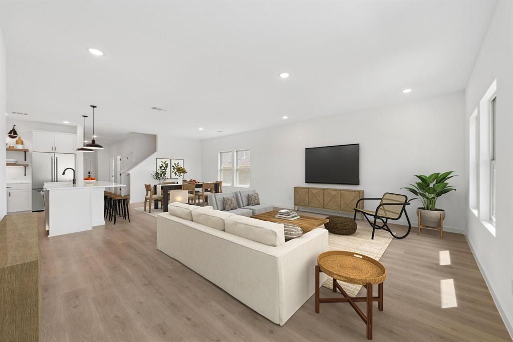 1412 Elliott Road Howe, TX 75459 - Photo 2 of 26 a living room with furniture and a flat screen tv