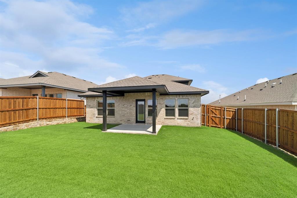 1412 Elliott Road Howe, TX 75459 - Photo 25 of 26 a view of a house with a yard and sitting area