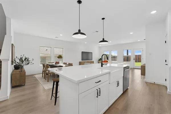 a view of kitchen center island and living room