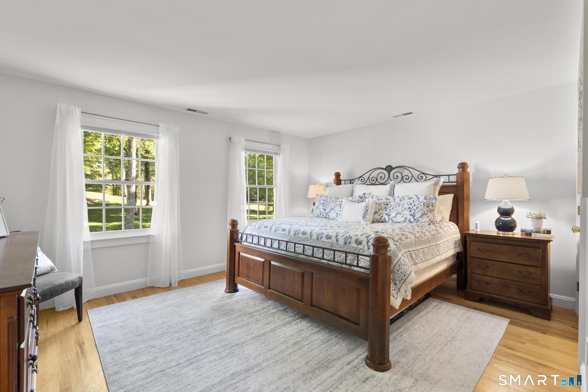 181 Old Branchville Road Ridgefield, CT 06877 - Photo 27 of 40 a bedroom with a bed and window