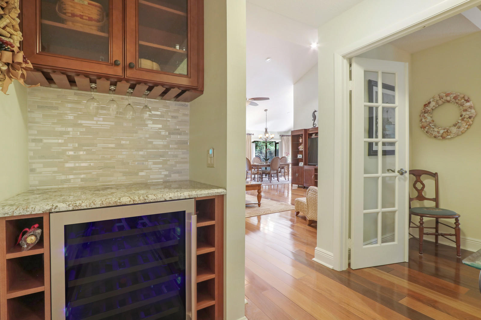 305 Natchez Court Jupiter, FL 33477 - Photo 20 of 37 Dry bar with wine fridge