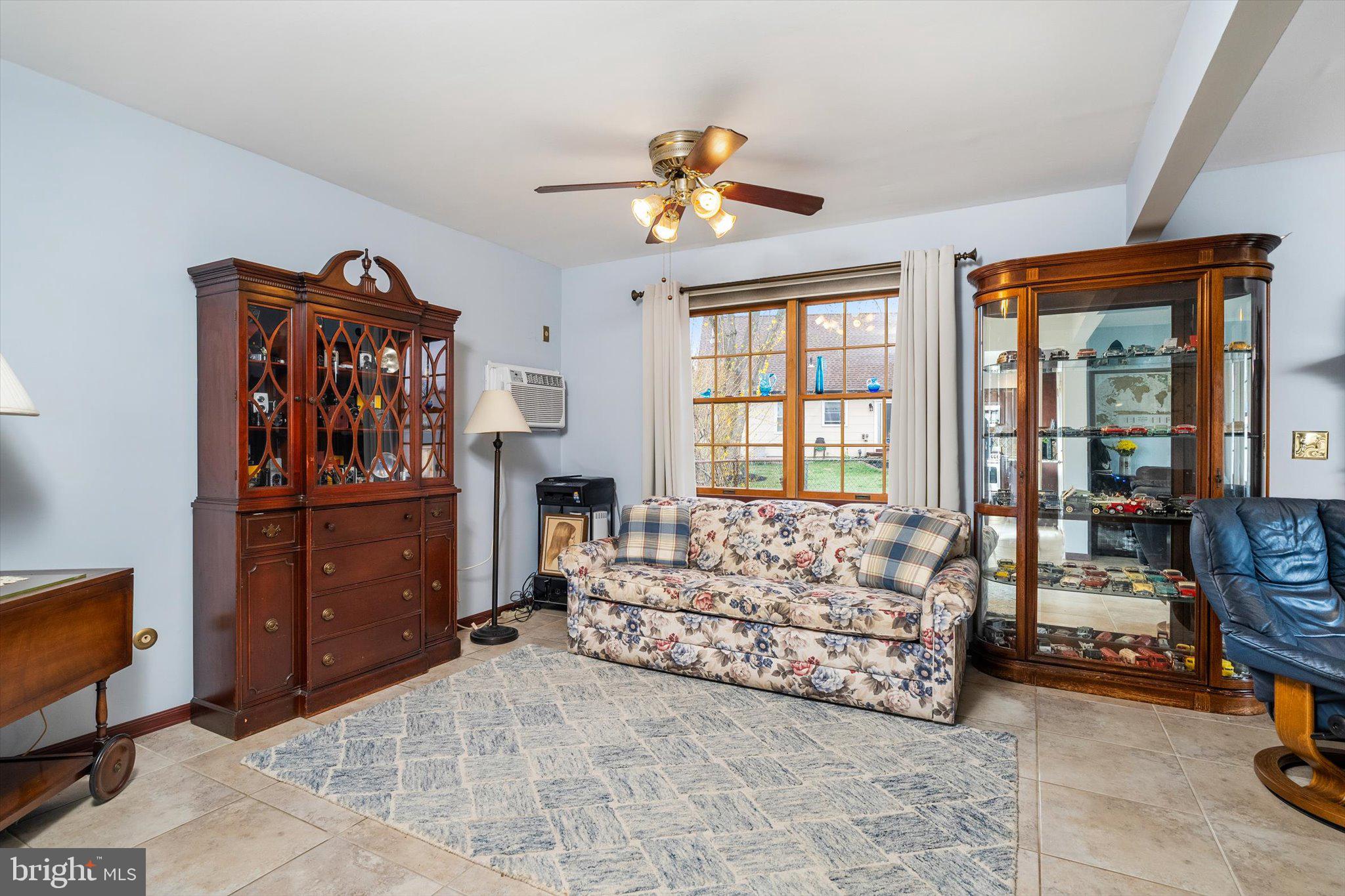 22 Hoffman Drive Hamilton, NJ 08690 - Photo 17 of 34 a living room with furniture and a window