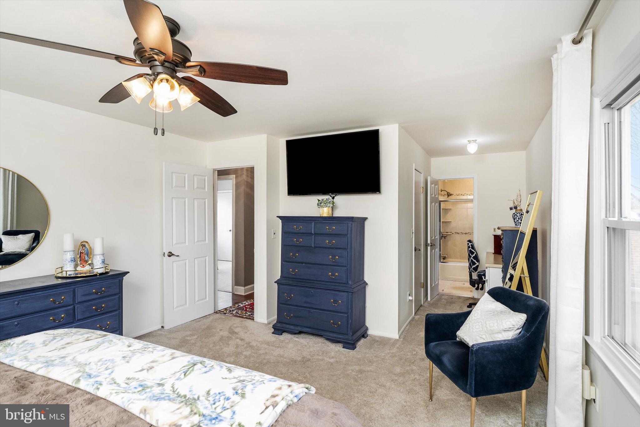 22 Hoffman Drive Hamilton, NJ 08690 - Photo 23 of 34 a bedroom with a bed and a flat screen tv