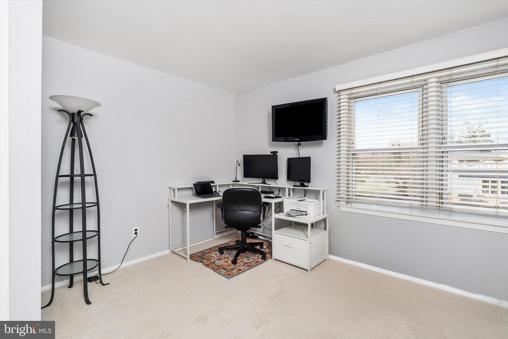 22 Hoffman Drive Hamilton, NJ 08690 - Photo 26 of 34 a view of a workspace with furniture and a window