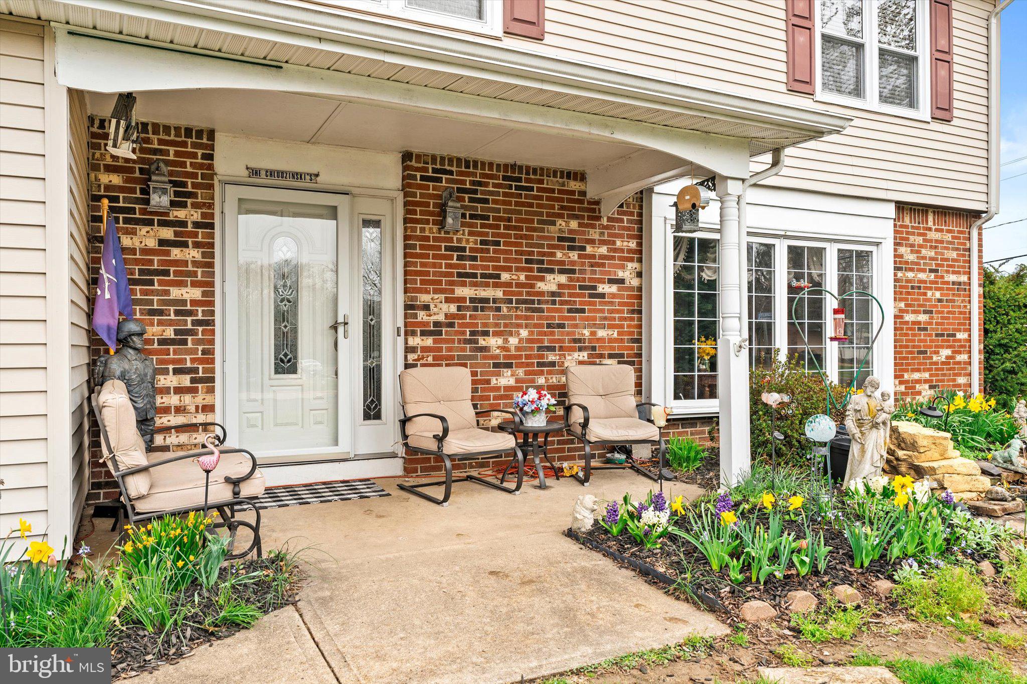 22 Hoffman Drive Hamilton, NJ 08690 - Photo 3 of 34 a backyard of a house with outdoor seating