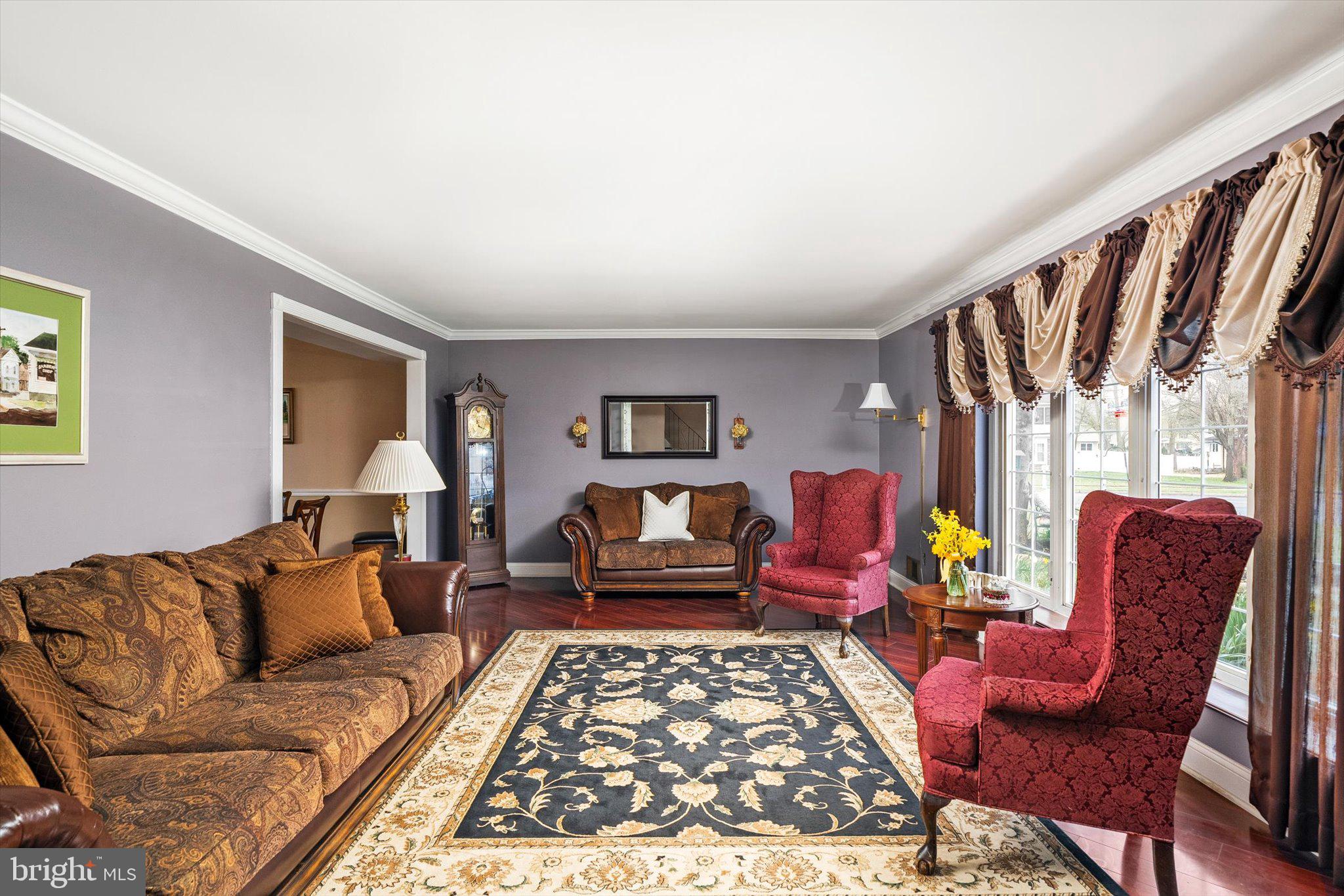 22 Hoffman Drive Hamilton, NJ 08690 - Photo 6 of 34 a living room with furniture and a rug
