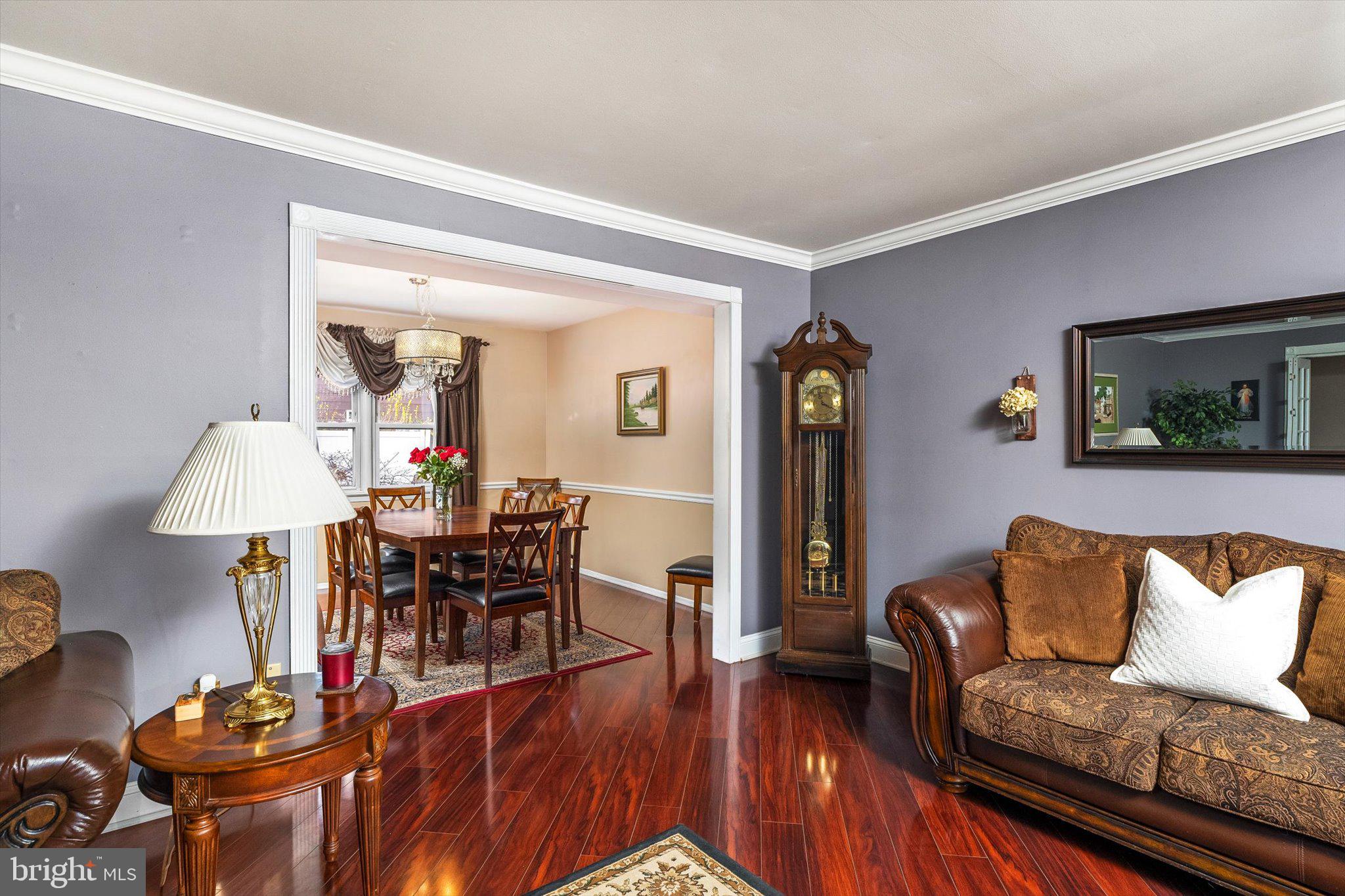 22 Hoffman Drive Hamilton, NJ 08690 - Photo 7 of 34 a living room with furniture and wooden floor