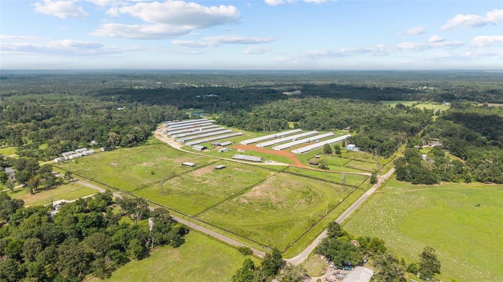 3216 Old Ewing Road Lufkin, TX 75901 - Photo 3 of 24 Expansive agricultural property featuring multiple pou, extensive open land, and perimeter fencing