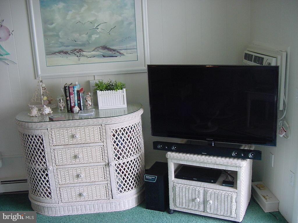 11 91st Street, Unit 102 Ocean City, MD 21842 - Photo 15 of 43 a kitchen with a stove and a microwave