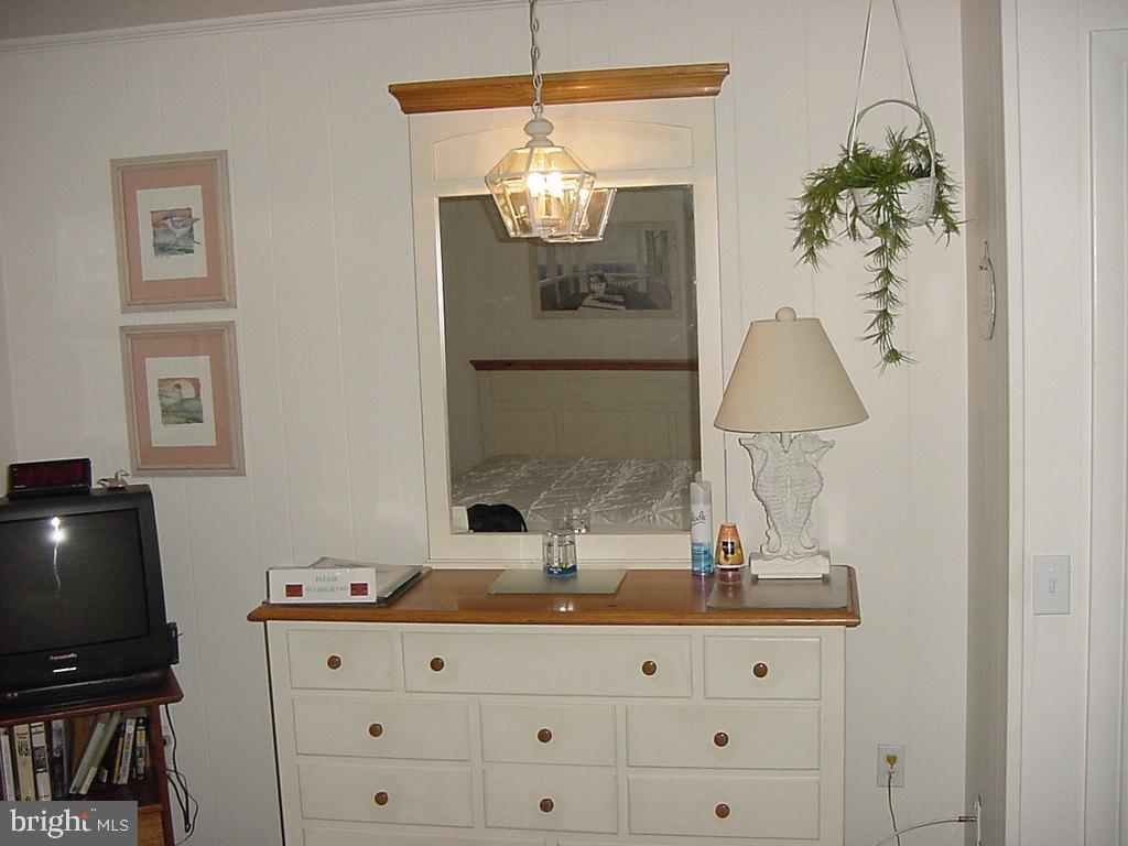 11 91st Street, Unit 102 Ocean City, MD 21842 - Photo 16 of 43 a bathroom with a sink and a mirror
