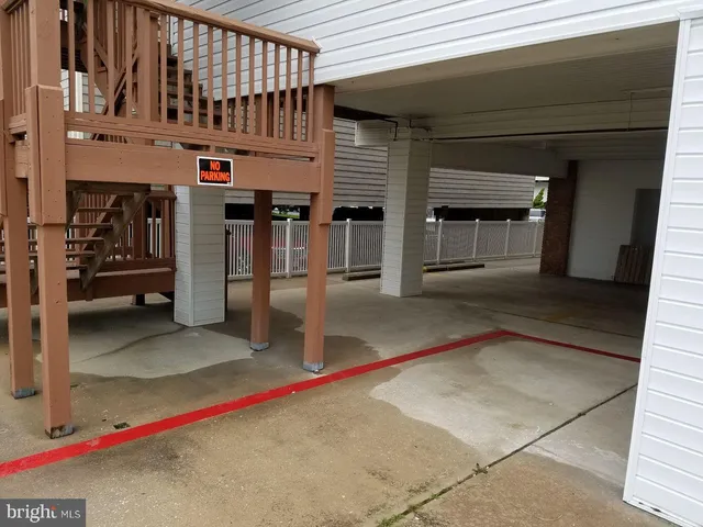 a view of a table and chairs in the garden