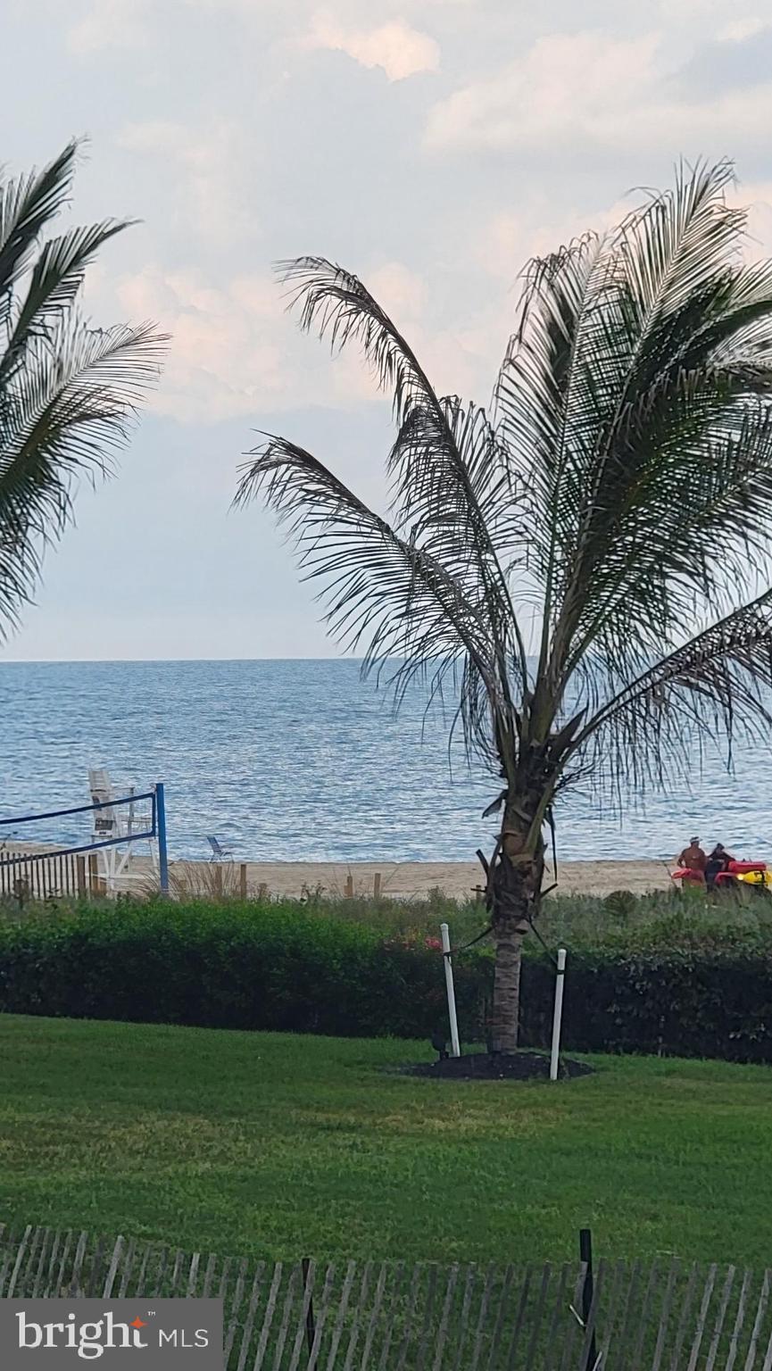 11 91st Street, Unit 102 Ocean City, MD 21842 - Photo 26 of 43 a view of a lake with a yard
