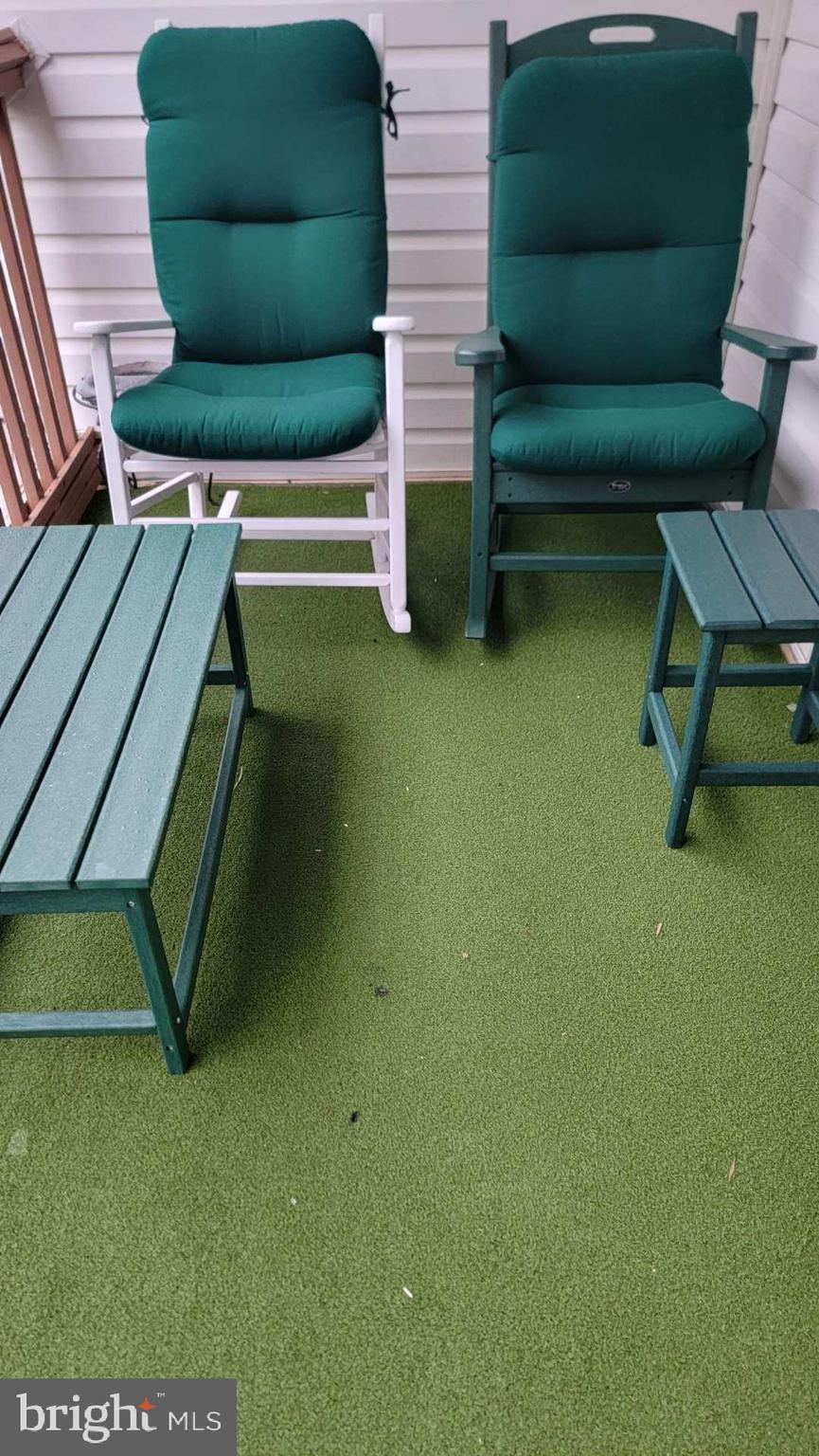 11 91st Street, Unit 102 Ocean City, MD 21842 - Photo 29 of 43 a view of a backyard with sitting area