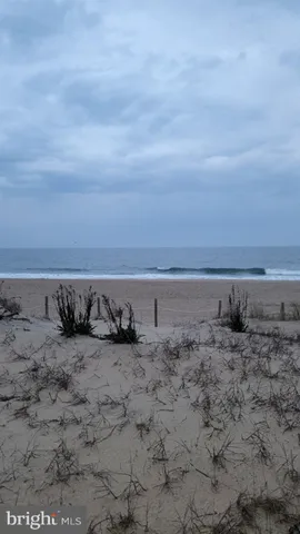 a backyard of a house with outdoor seating