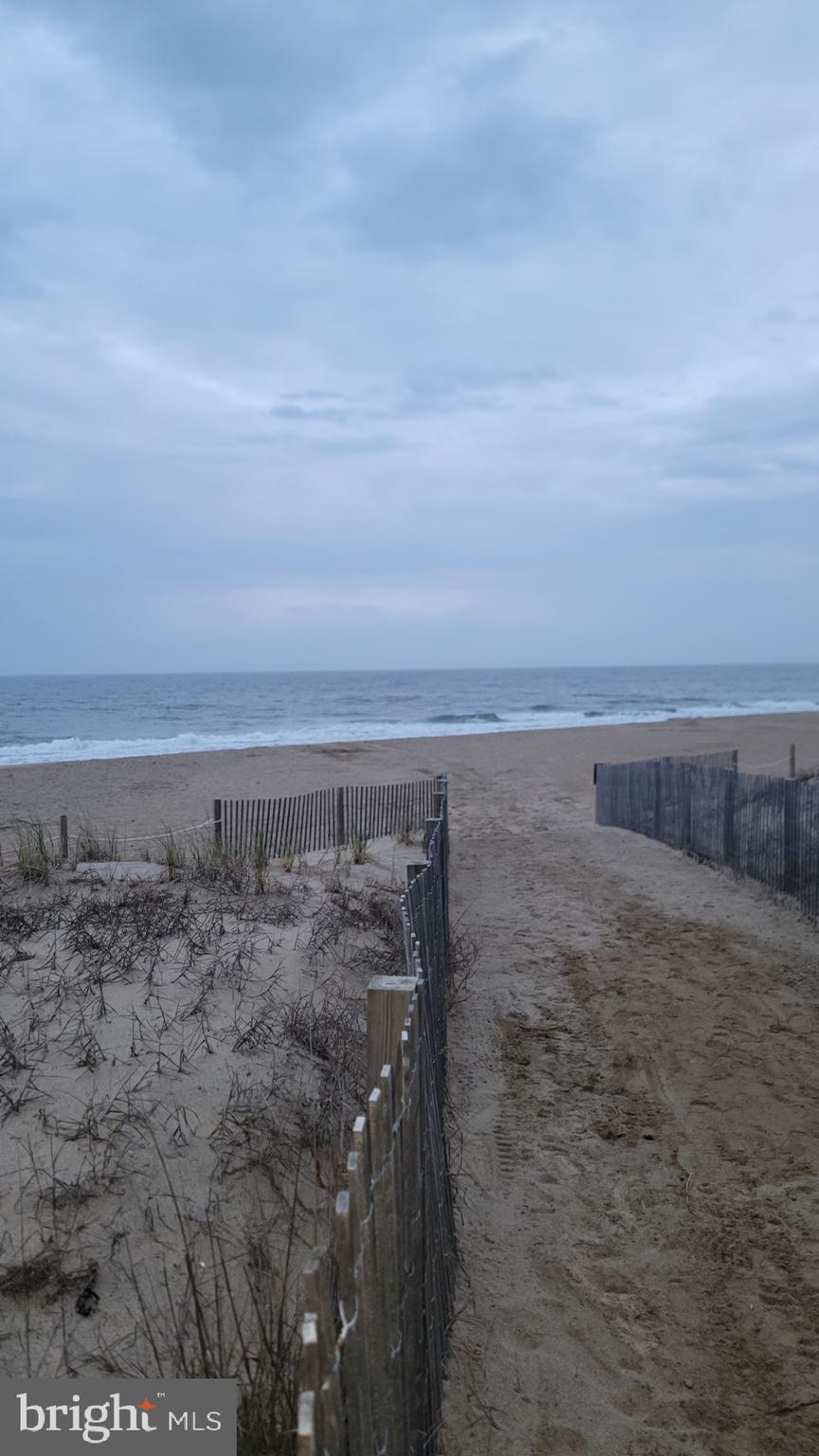 11 91st Street, Unit 102 Ocean City, MD 21842 - Photo 33 of 43 a view of an ocean beach