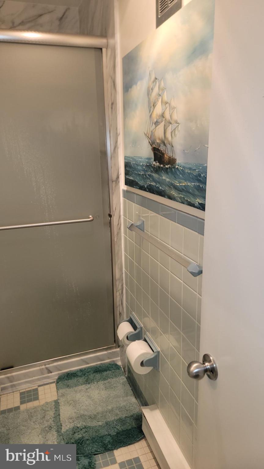 11 91st Street, Unit 102 Ocean City, MD 21842 - Photo 40 of 43 a bathroom with a shower
