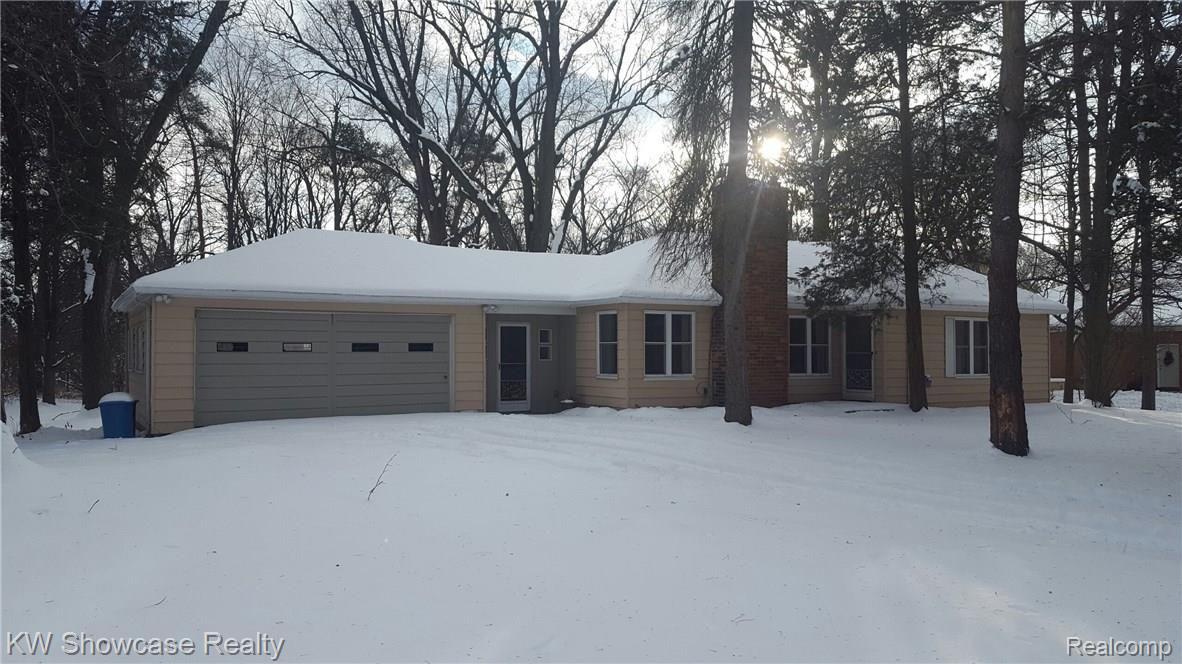 1676 Leon Road Walled Lake, MI 48390 - Photo 1 of 39 1676 leon Snow Front Elev.