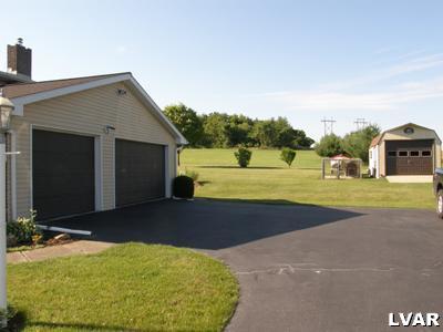 220 Barlieb Road Nazareth, PA 18064 - Photo 3 of 8 a view of a house with a yard