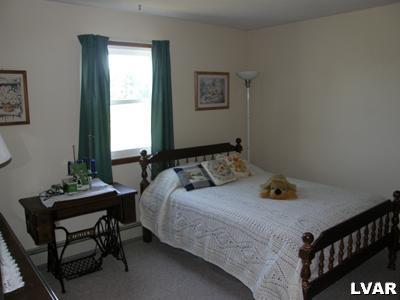 220 Barlieb Road Nazareth, PA 18064 - Photo 8 of 8 a bedroom with a bed and a window