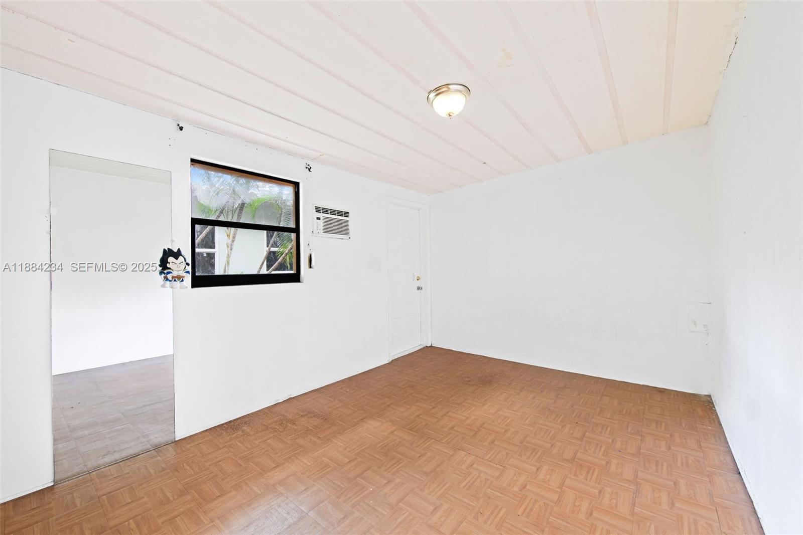 1932 Adams Street Hollywood, FL 33020 - Photo 7 of 11 a view of a room that has a window