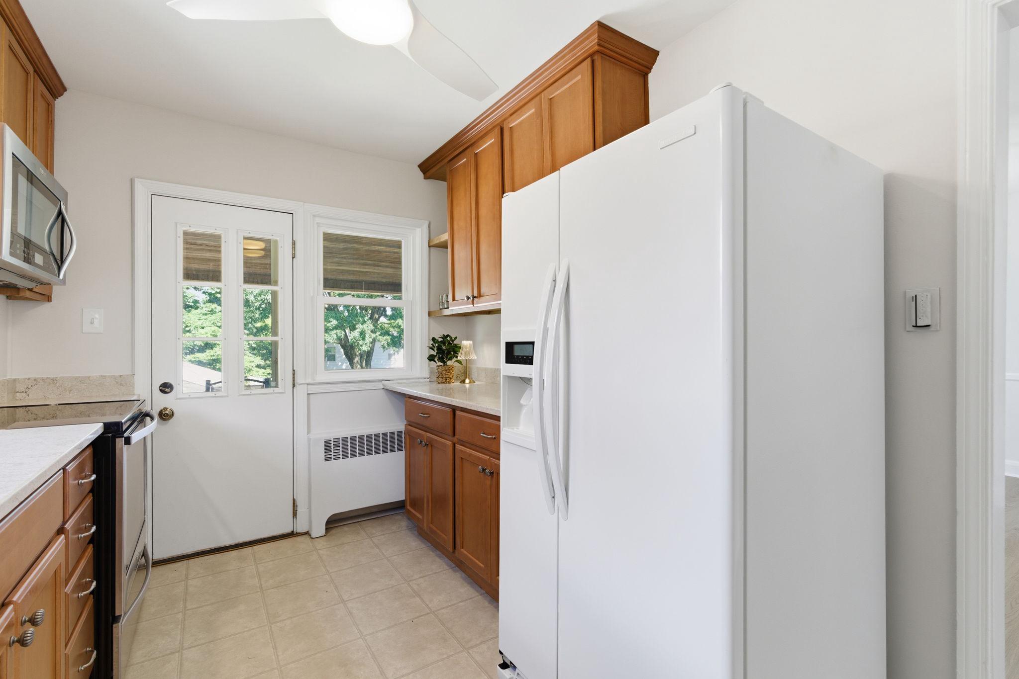 305 Gralan Road Catonsville, MD 21228 - Photo 13 of 38 Galley kitchen opens to covered porch!