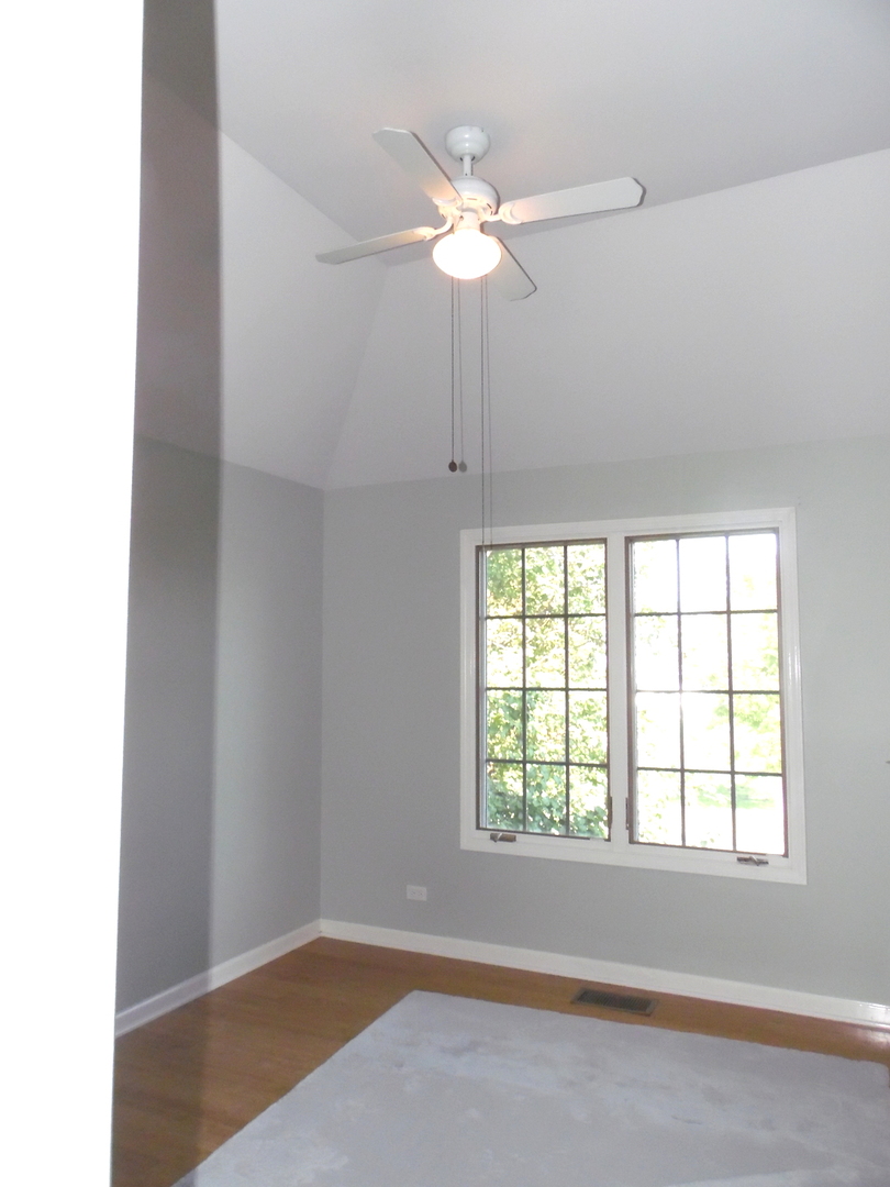 19057 South Saddlebrook Drive Shorewood, IL 60404 - Photo 30 of 56 an empty room with windows and fan
