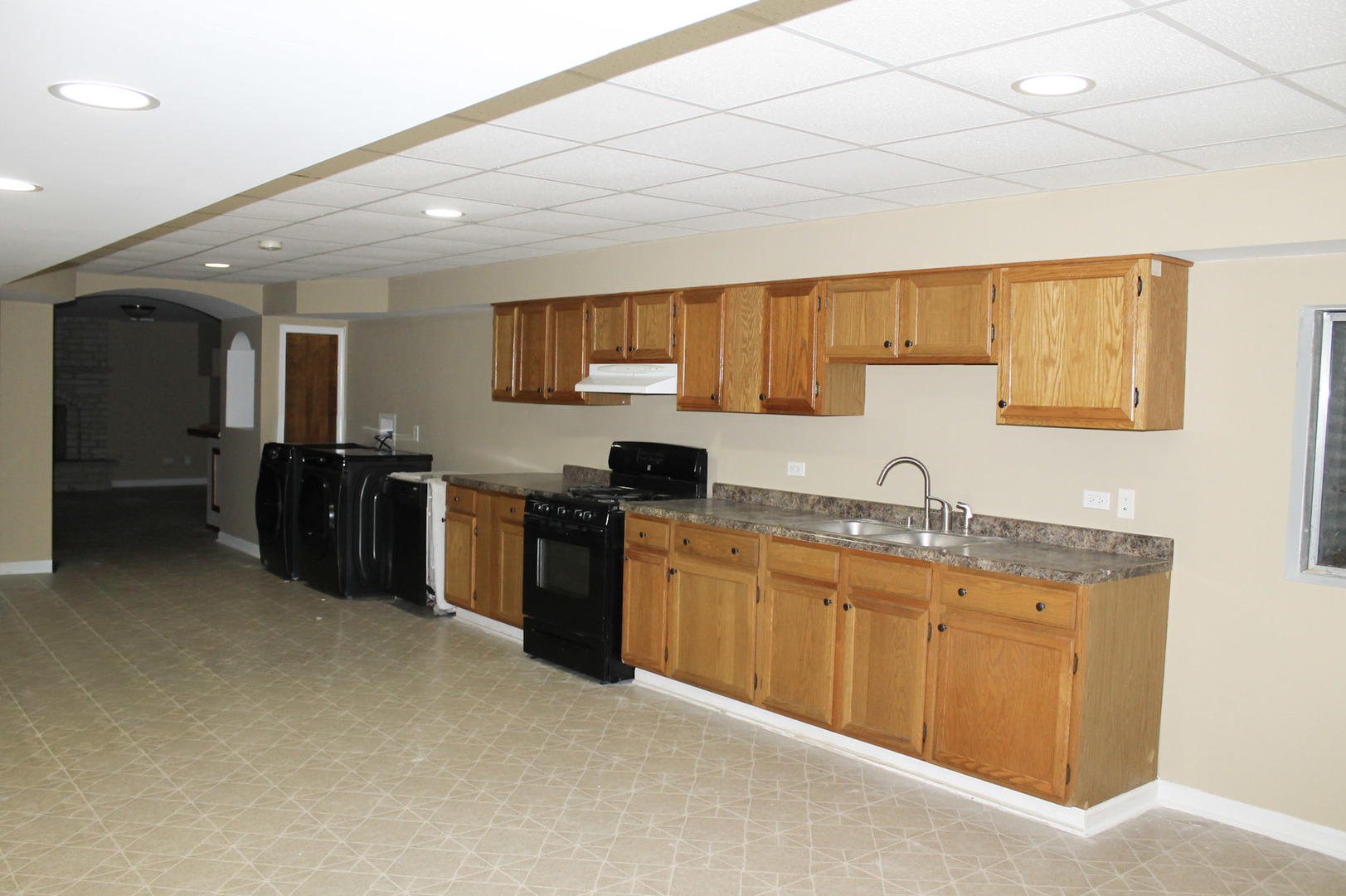 19057 South Saddlebrook Drive Shorewood, IL 60404 - Photo 39 of 56 a kitchen with a sink and cabinets