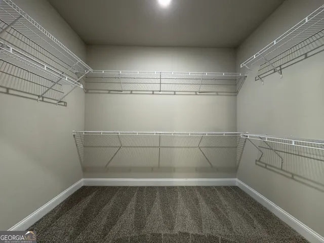 a view of a room with racks on the wall