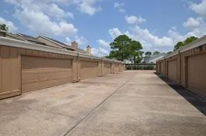 a view of a door and wooden floor
