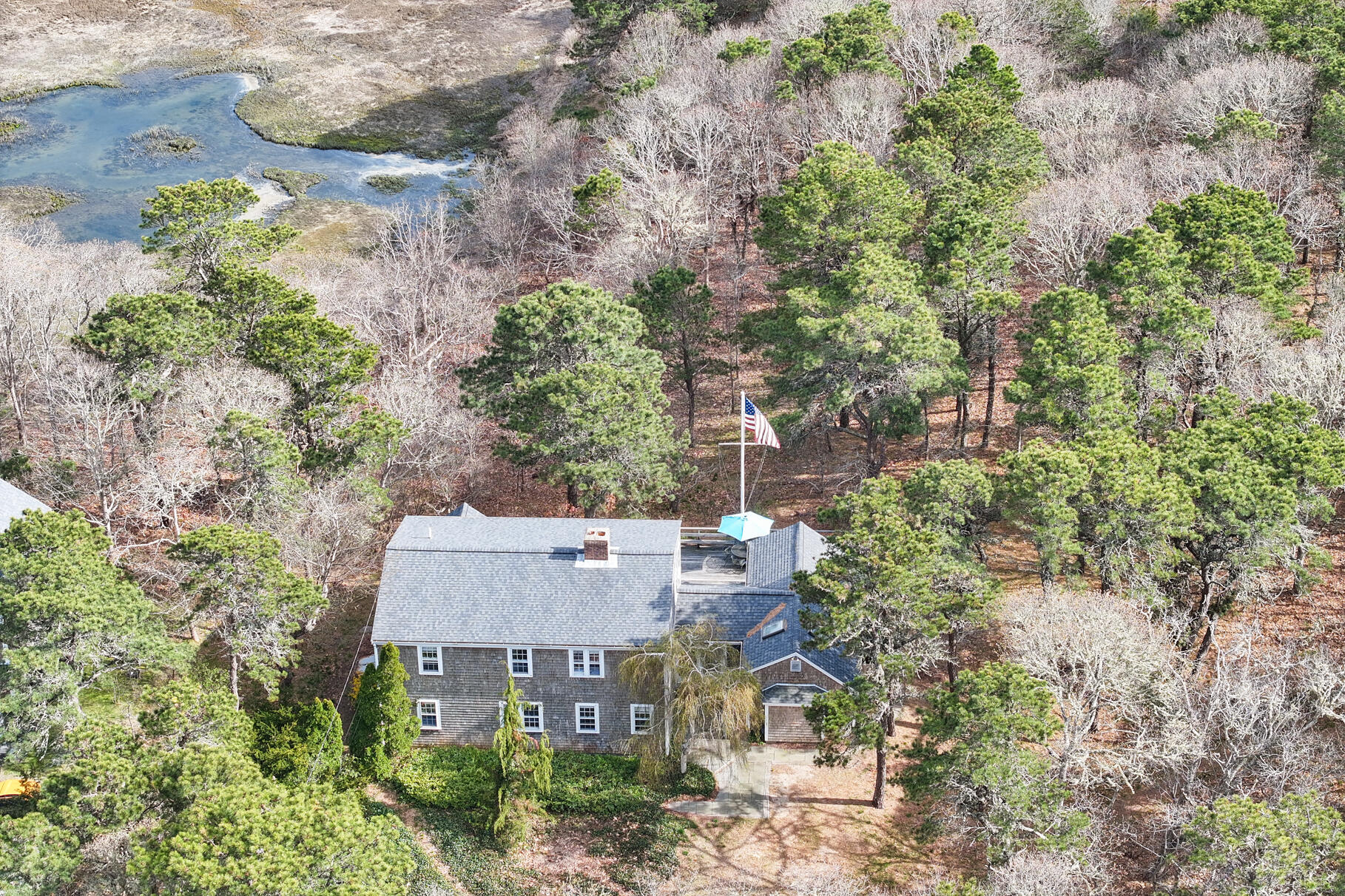 189 Bay View Road Chatham, MA 02659 - Photo 9 of 59 an aerial view of a house with yard and outdoor seating