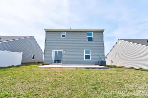 a view of an house with backyard space