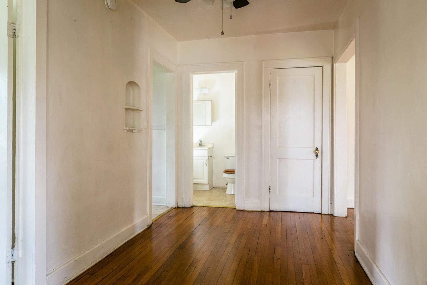 613 Alpha Street Waynesboro, VA 22980 - Photo 14 of 16 an empty room with wooden floor and windows
