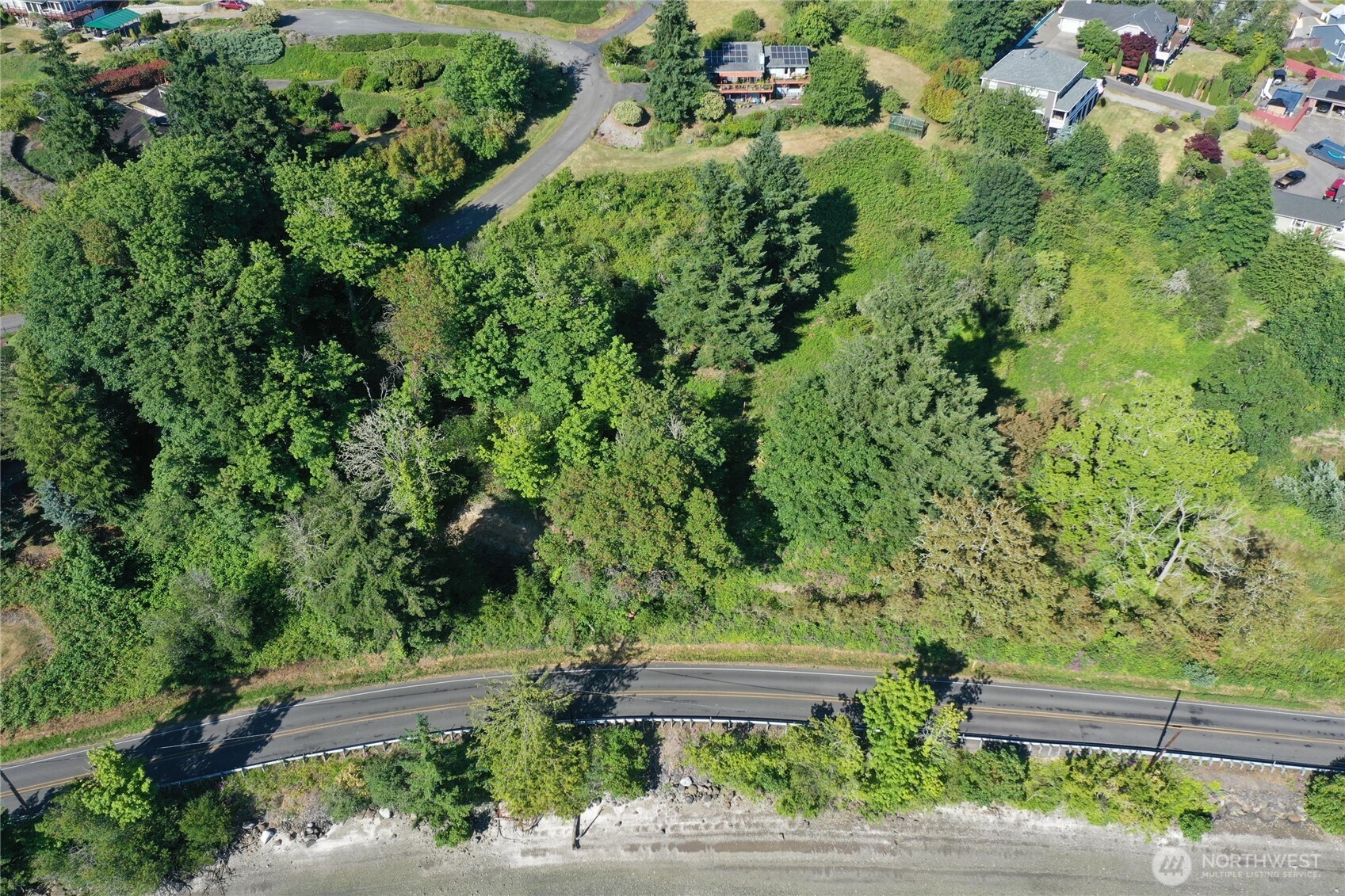 -xxx Tracyton Beach Road Northwest Bremerton, WA 98310 - Photo 17 of 26 an aerial view of a house with a yard