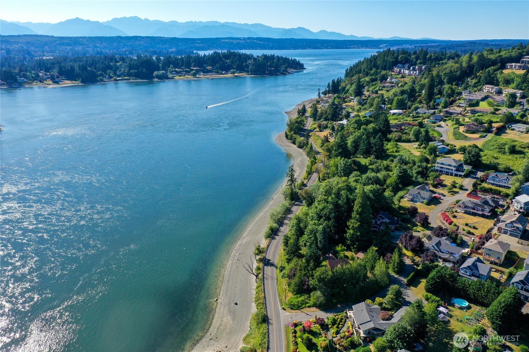 -xxx Tracyton Beach Road Northwest Bremerton, WA 98310 - Photo 22 of 26 a view of a lake with a mountain in the background