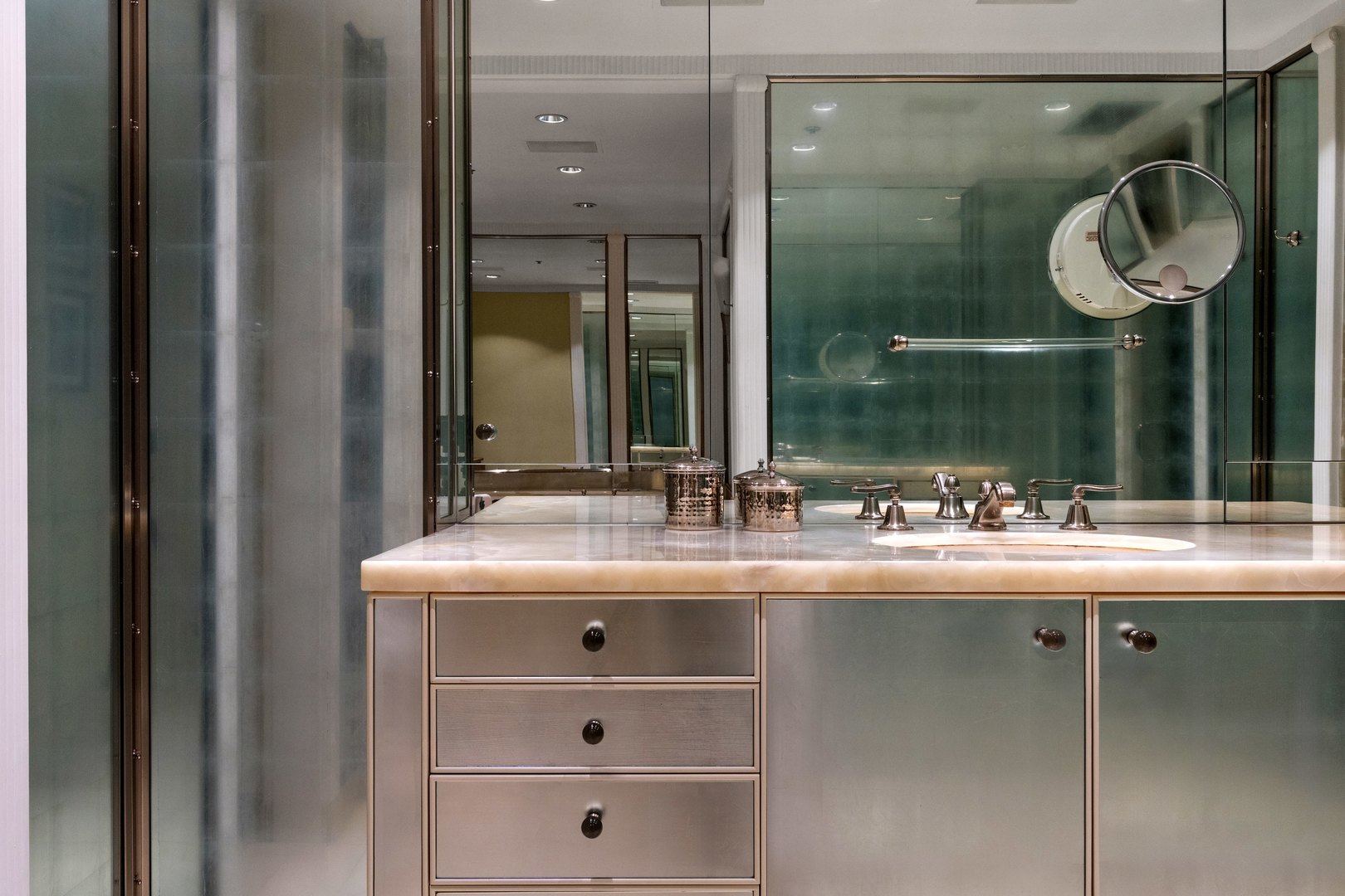 180 East Pearson Street, Unit 3304 Chicago, IL 60611 - Photo 13 of 17 a bathroom with a sink and a mirror