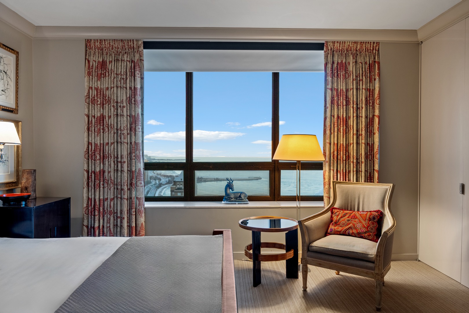 180 East Pearson Street, Unit 3304 Chicago, IL 60611 - Photo 14 of 17 a bedroom with furniture and a window