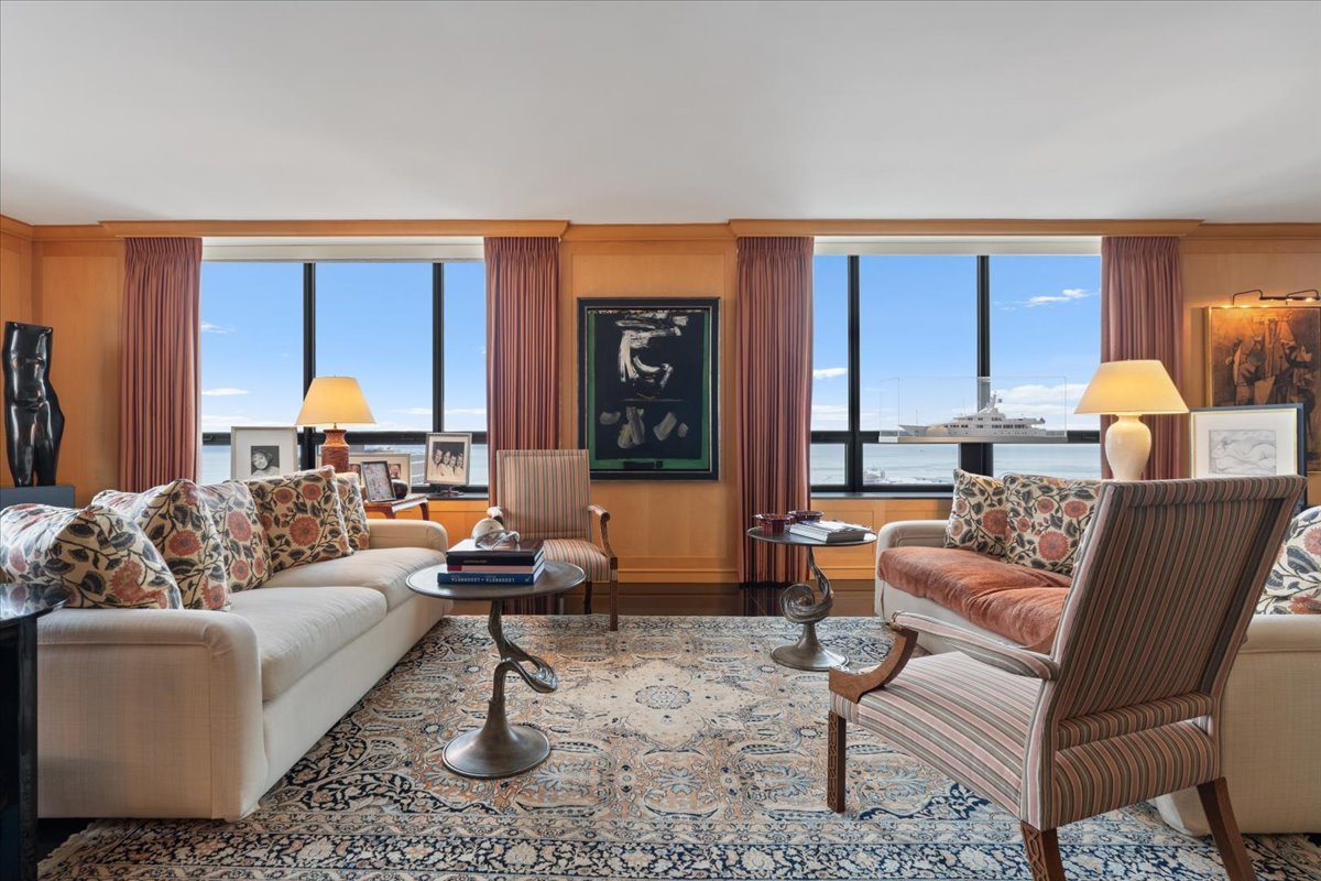 180 East Pearson Street, Unit 3304 Chicago, IL 60611 - Photo 5 of 17 a living room with furniture and a large window