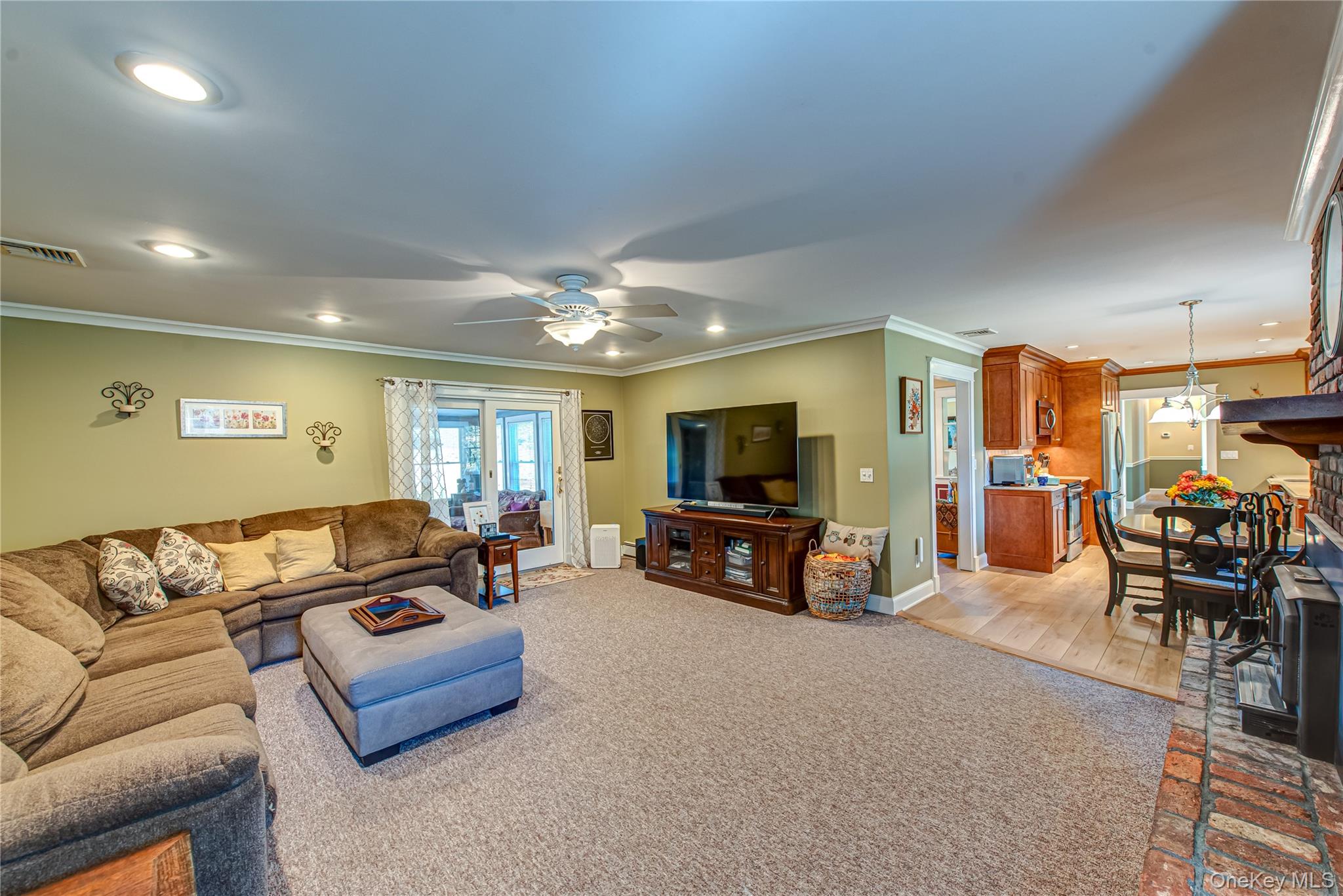 3 Walnut Road Rocky Point, NY 11778 - Photo 20 of 46 a living room with furniture and a flat screen tv
