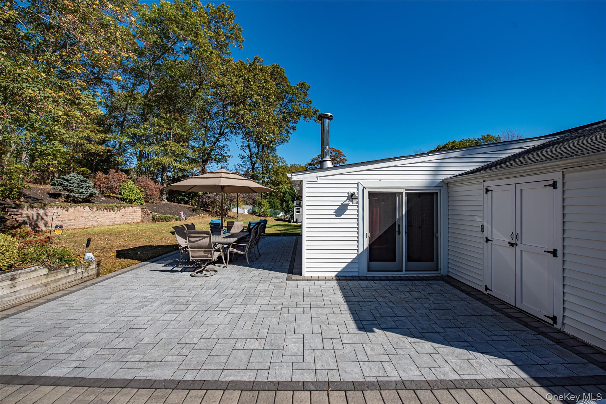 3 Walnut Road Rocky Point, NY 11778 - Photo 36 of 46 a bench sitting in the middle of a house