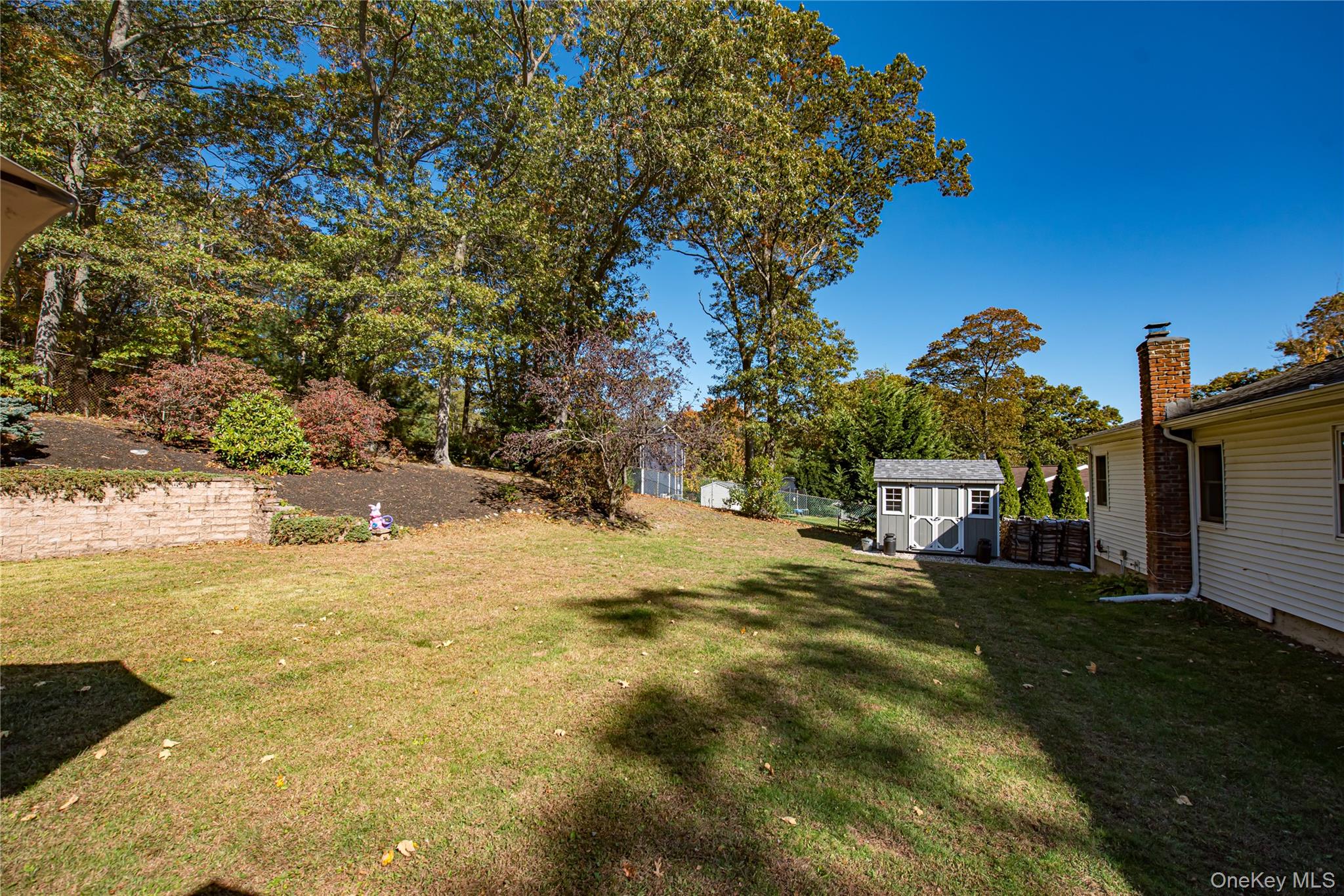 3 Walnut Road Rocky Point, NY 11778 - Photo 38 of 46 a view of a yard with swimming pool