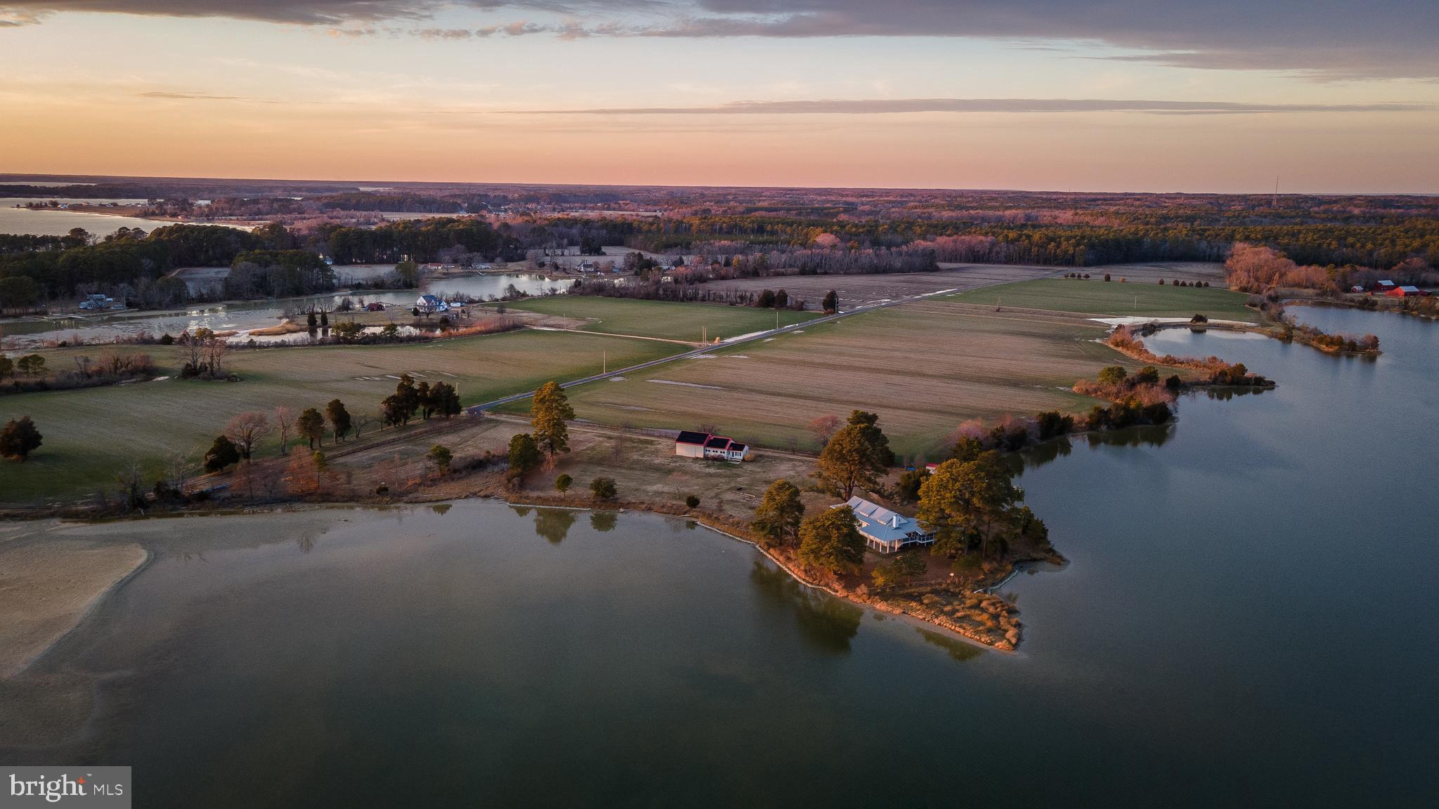 49005 Harry James Road Ridge, MD 20680 - Photo 1 of 71 a view of a lake in middle of the town