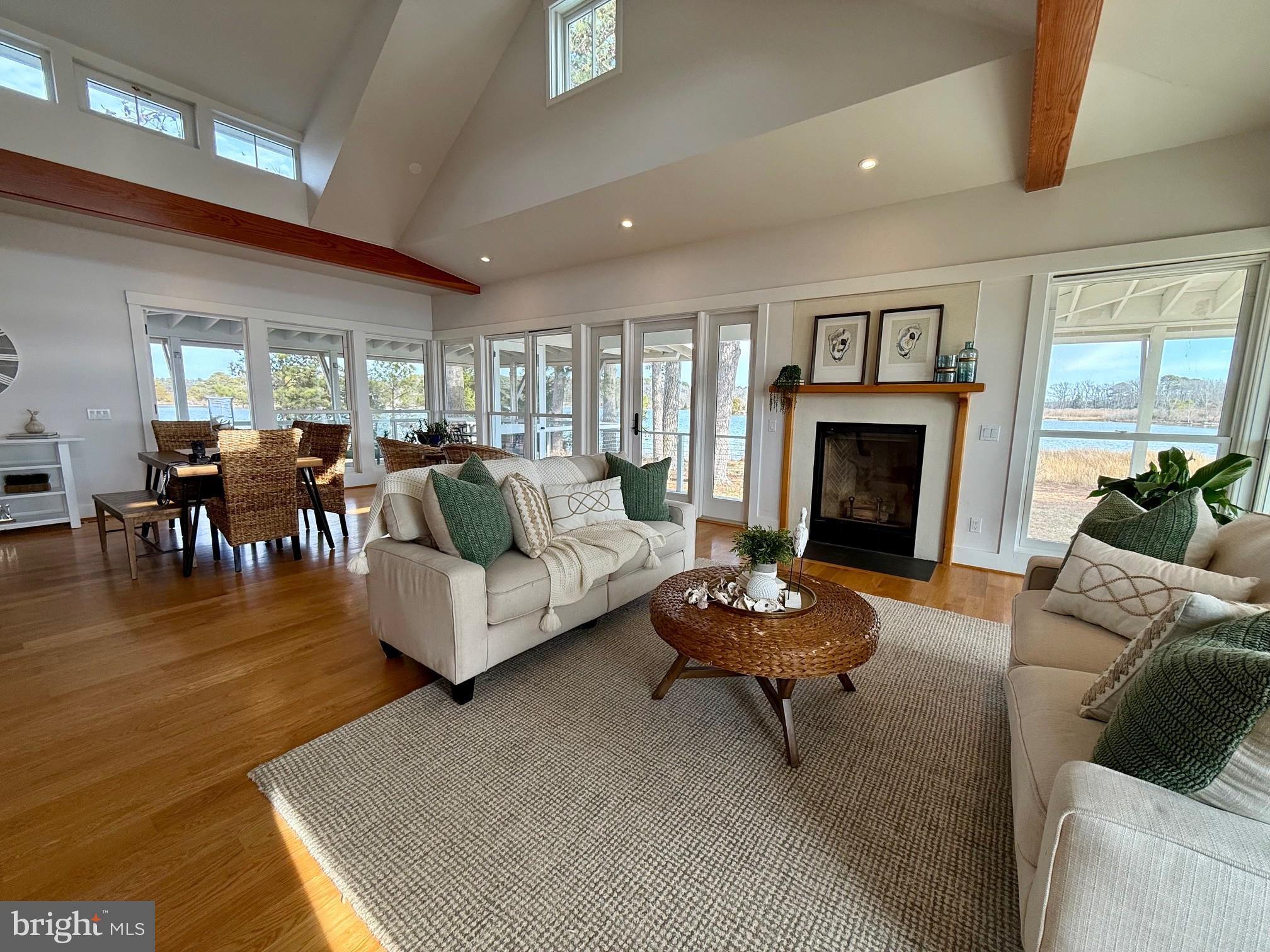 49005 Harry James Road Ridge, MD 20680 - Photo 15 of 71 a living room with furniture and a fireplace