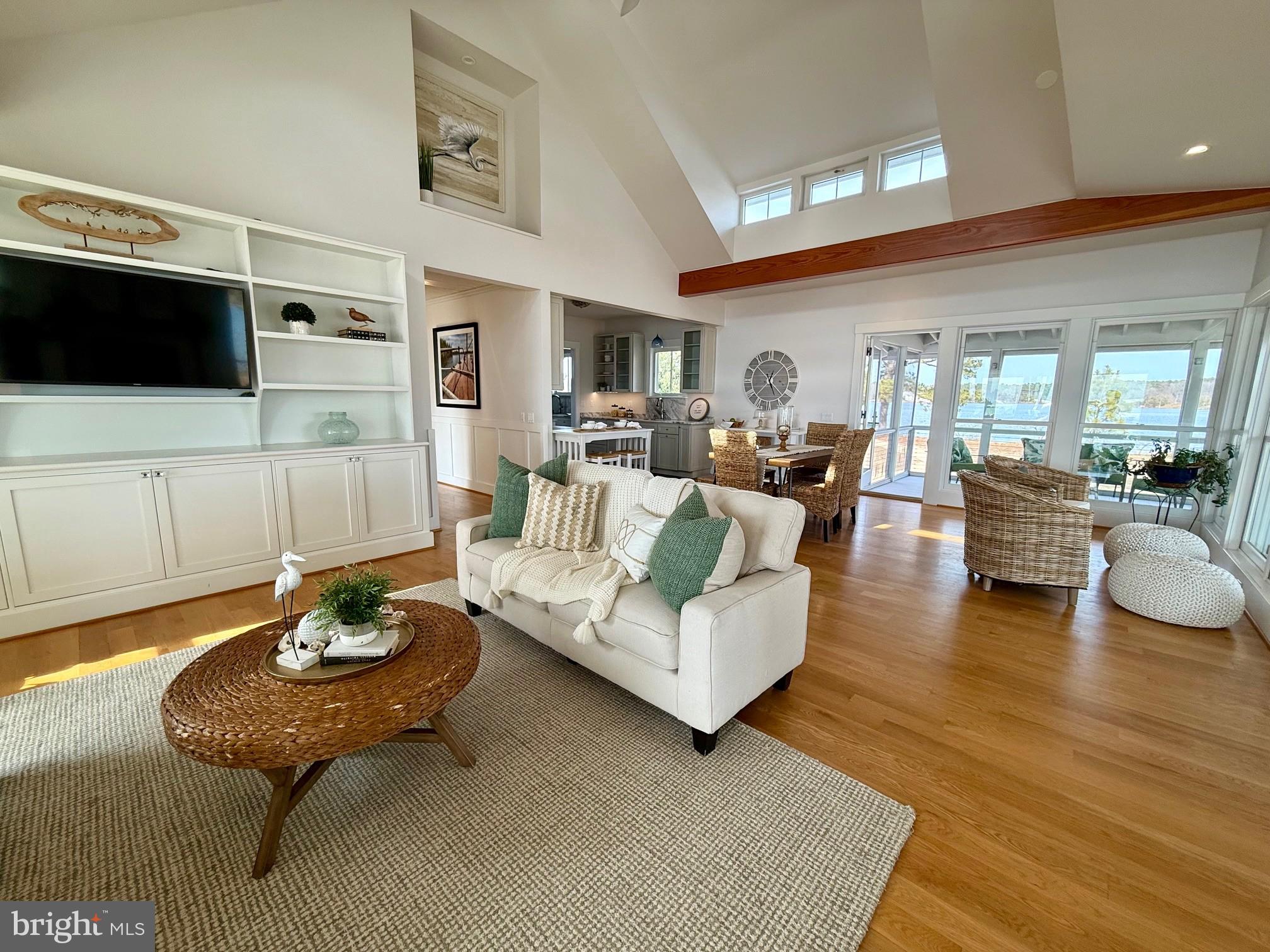 49005 Harry James Road Ridge, MD 20680 - Photo 17 of 71 a living room with furniture and a flat screen tv
