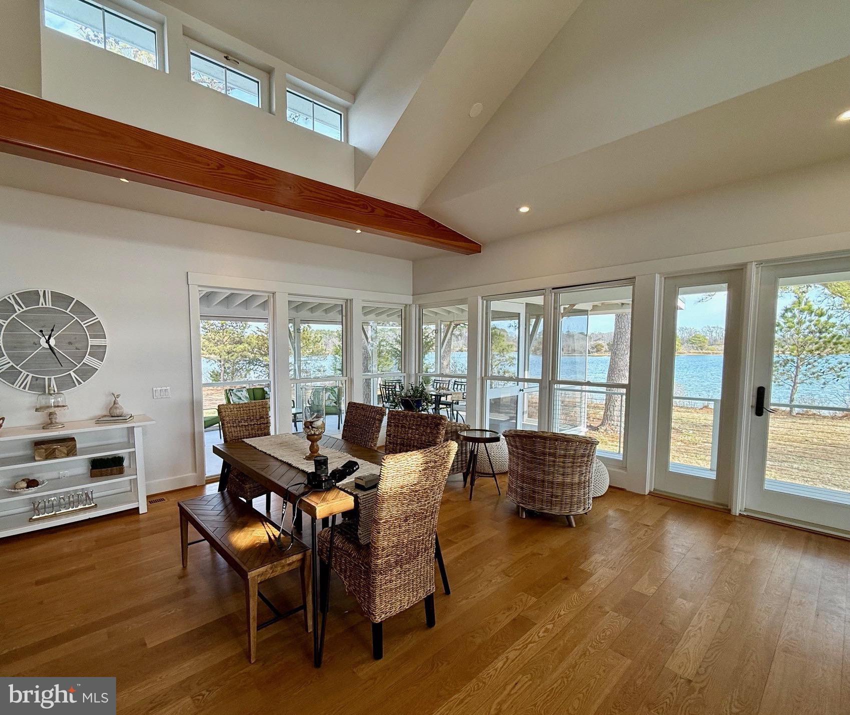 49005 Harry James Road Ridge, MD 20680 - Photo 18 of 71 a dining room with furniture window wooden floor