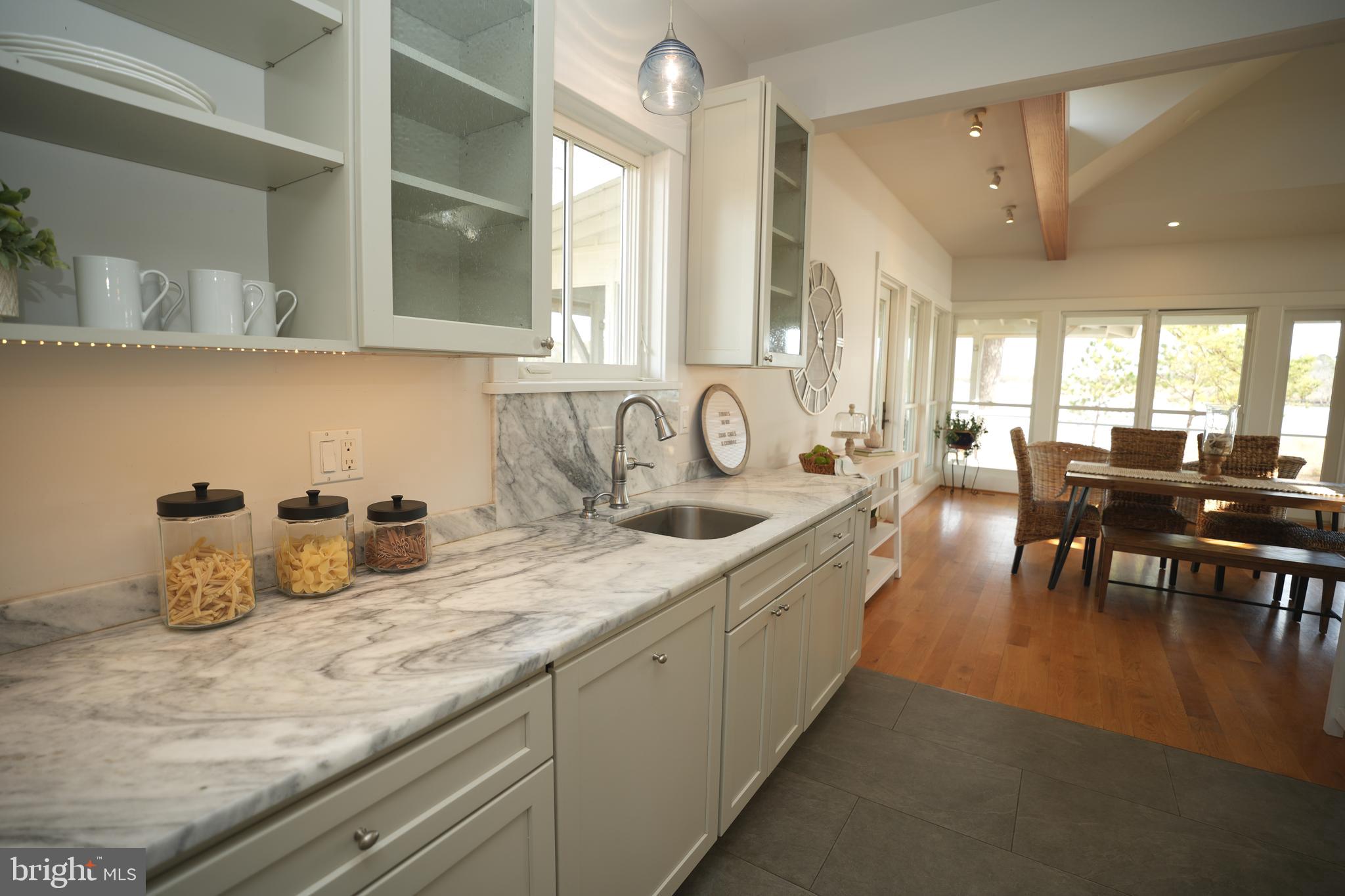 49005 Harry James Road Ridge, MD 20680 - Photo 23 of 71 a kitchen with sink and cabinets